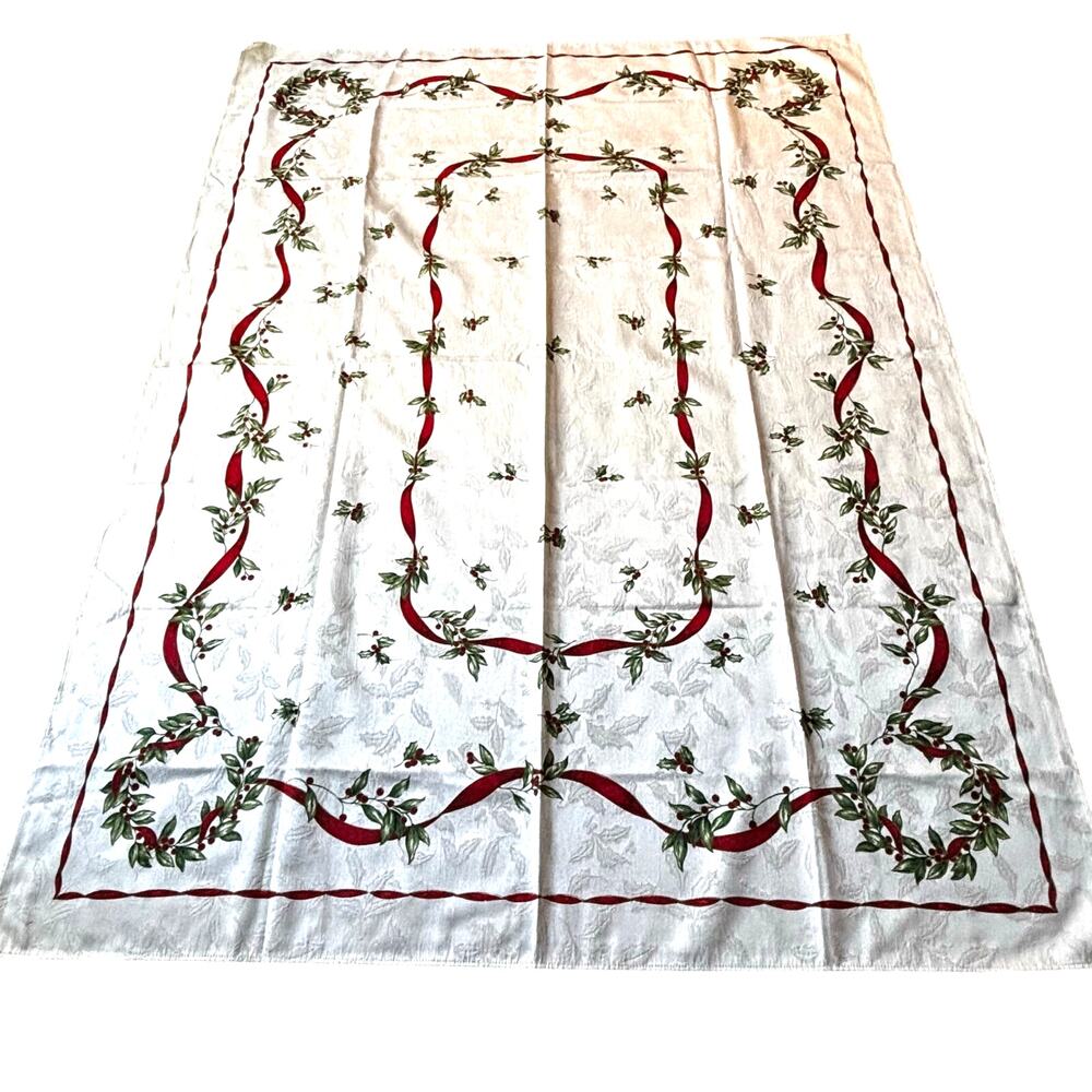Vintage Christmas tablecloth creamy white brocade red green ribbon holly design